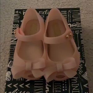 New in box mini Melissa size 5